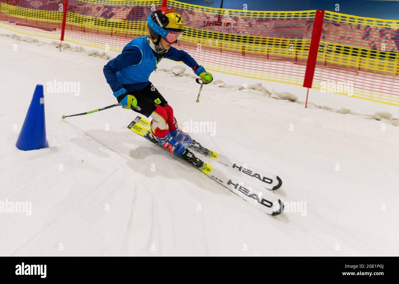 Bispingen, Germany. 27th July, 2021. Ansgar skis down the slope in the Snow Dome. (to dpa: 'Tinkering in the ski hall - for the grippy snow in summer') Credit: Philipp Schulze/dpa/Alamy Live News Stock Photo