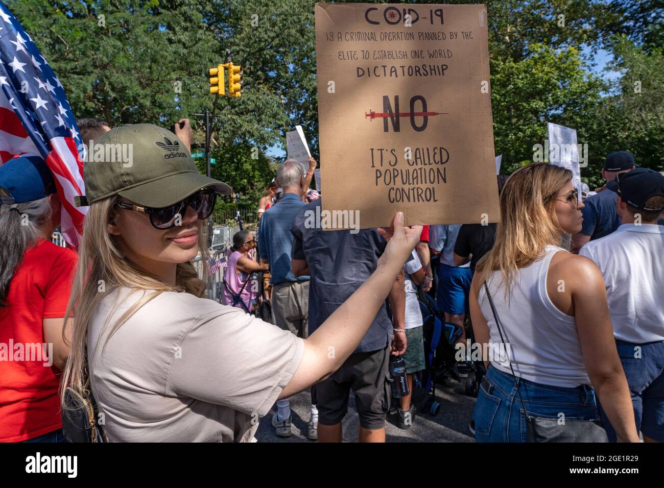 NEW YORK, NY - AUGUST 15: A woman holds a at a Republicans Rally against COVID vaccine mandates outside of Gracie Mansion on August 15, 2021 in New York City.   NYC vaccine mandate starts Monday, August 16th.   Proof of coronavirus (COVID-19) vaccination will be required to attend indoor restaurants, gyms, and entertainment venues with enforcement of the mandate to begin on September 13th. Credit: Ron Adar/Alamy Live News Stock Photo