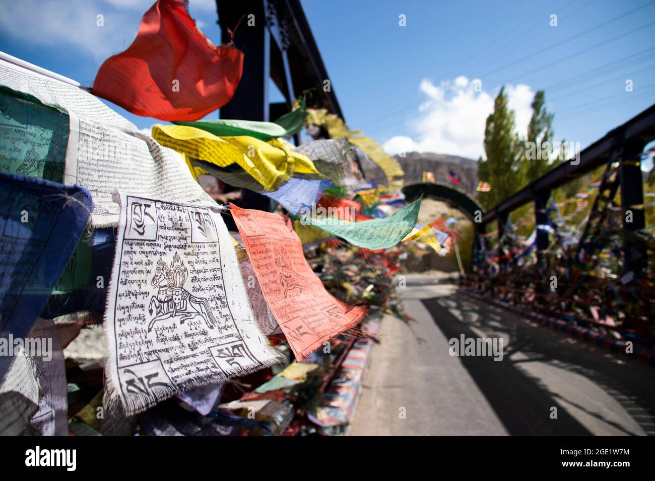 Buddhist Prayer Flag on a bridge Stock Photo