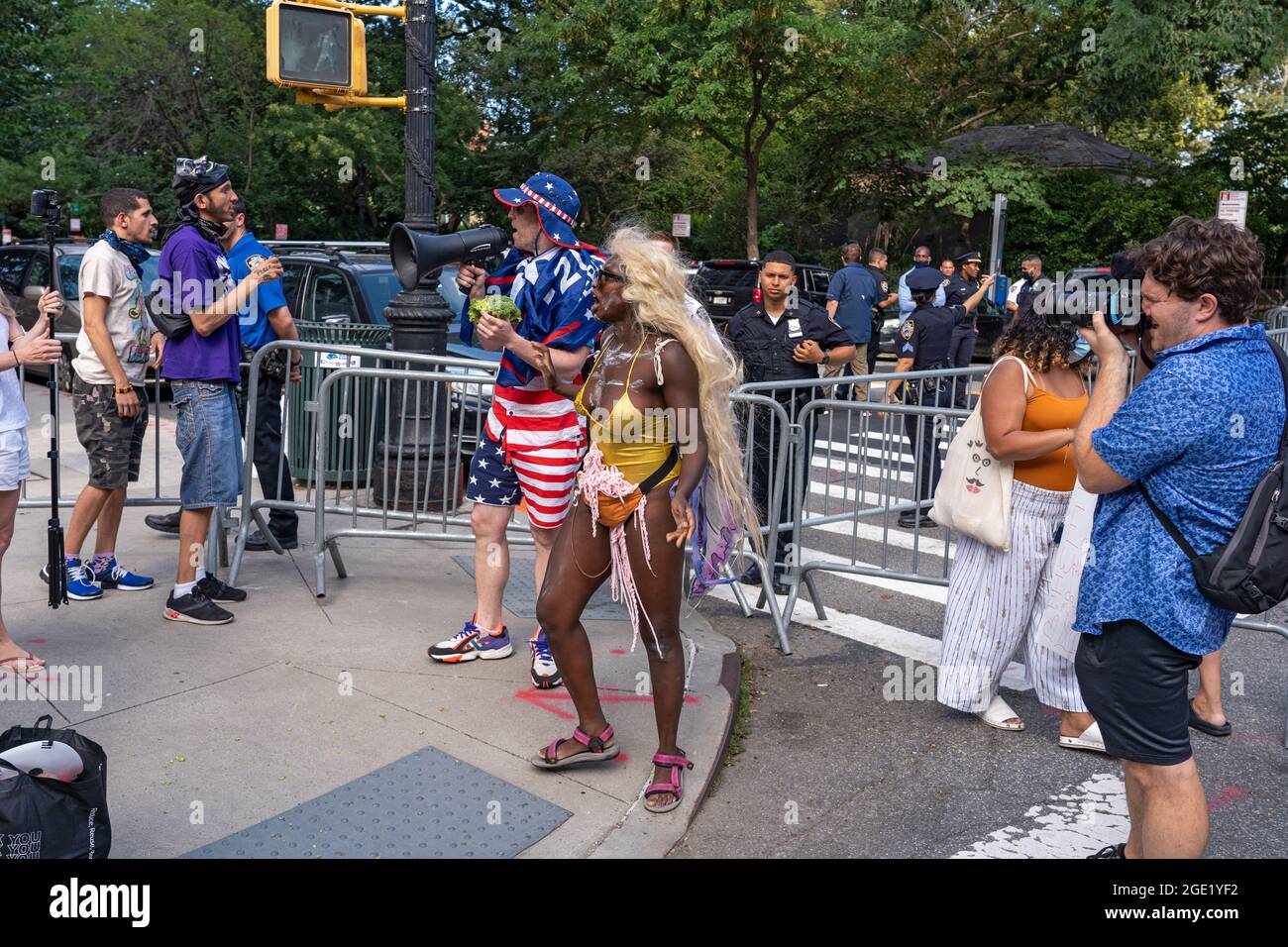 New York, United States. 15th Aug, 2021. Counter protesters interrupt a Republicans Rally against COVID vaccine mandates outside Gracie Mansion in New York City.NYC vaccine mandate starts Monday, August 16th; Proof of coronavirus (COVID-19) vaccination will be required to attend indoor restaurants, gyms, and entertainment venues with enforcement of the mandate to begin on September 13th. Credit: SOPA Images Limited/Alamy Live News Stock Photo