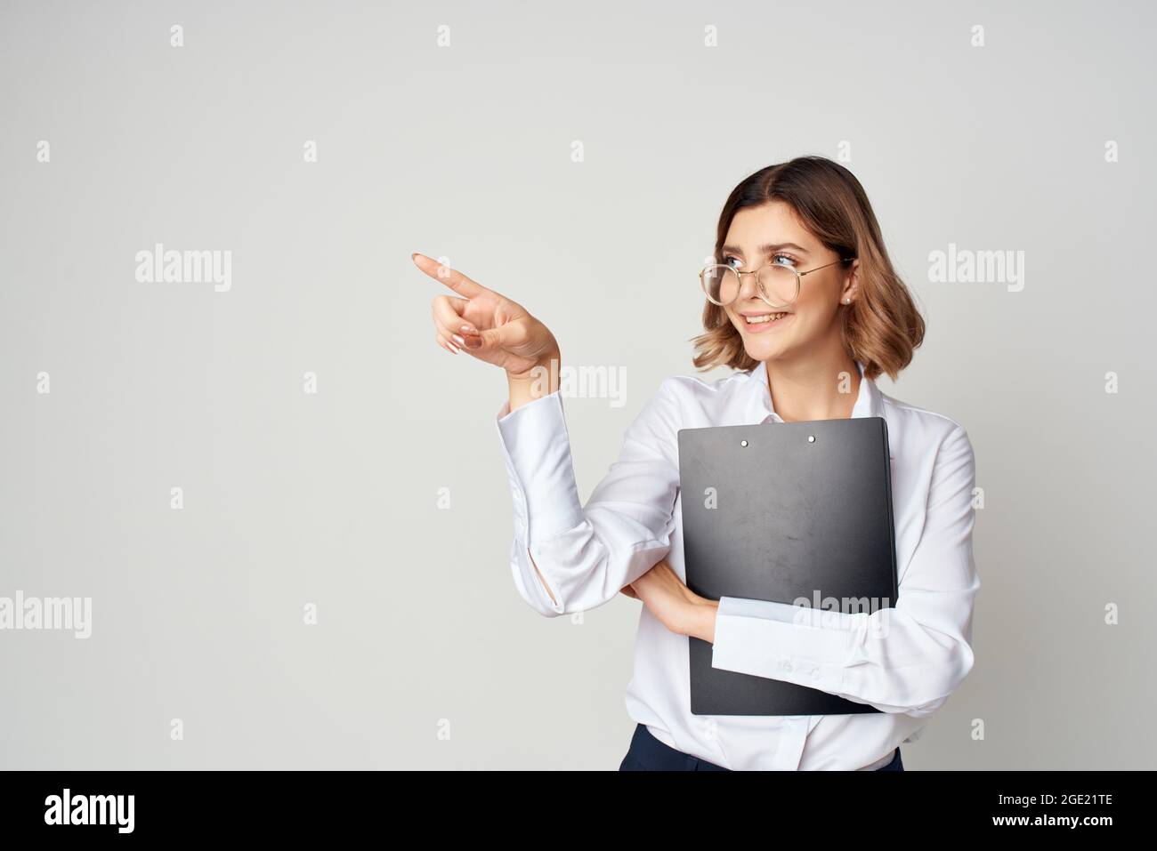 cheerful woman manager in white shirt documents work professional Stock ...