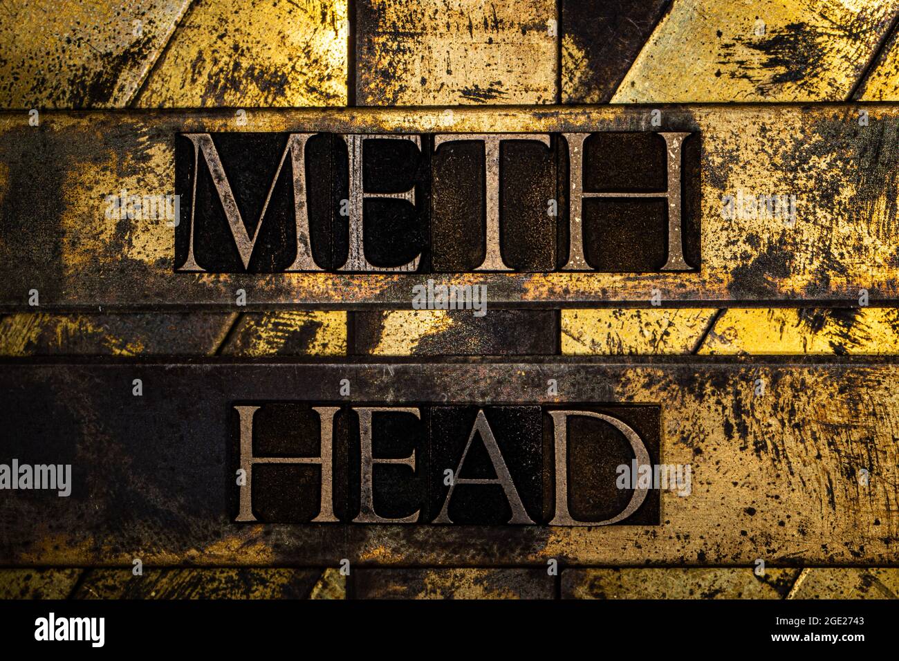 Meth Head text message on textured grunge copper and vintage gold