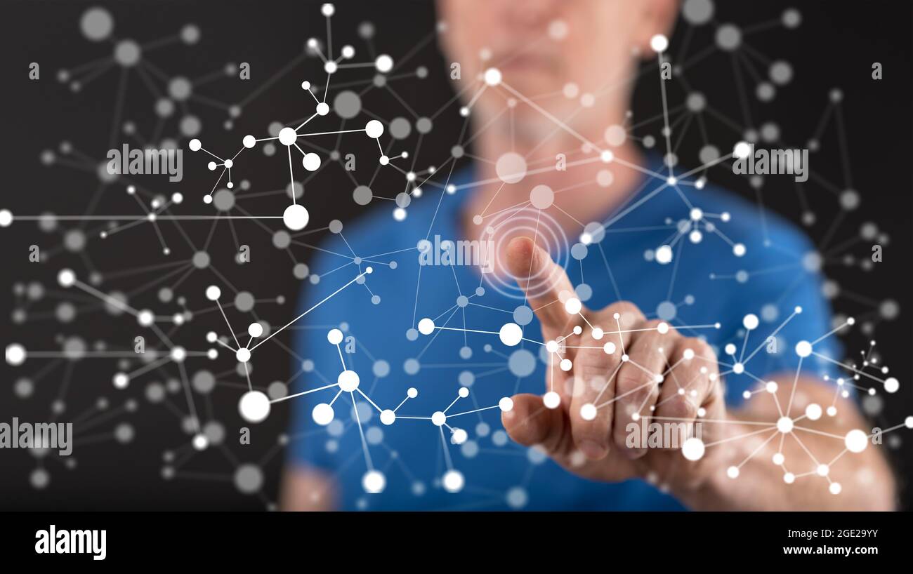 Man touching a virtual network on a touch screen with his finger Stock ...