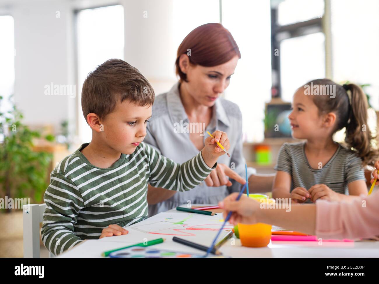 Nursery teacher and children hi-res stock photography and images - Alamy