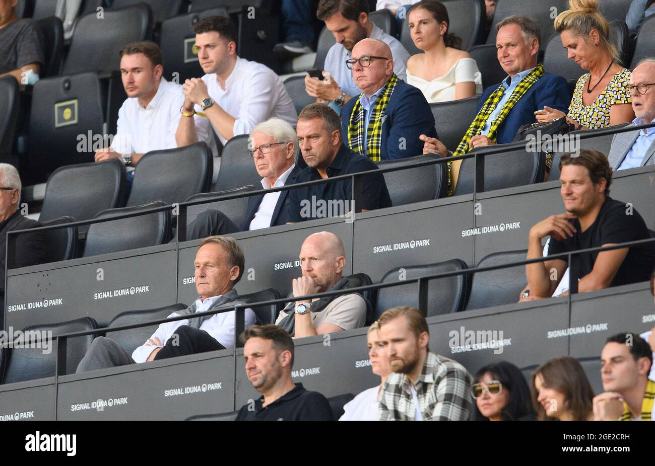 coach/federal coach Hans-Dieter 'Hansi' FLICK next to Dr. Reinhard RAUBALL (DO President, DFL League President) on the tribune, dvaor left to right Hans-Joachim WATZKE (DO, Chairman Managing Director), Matthias SAMMER (DO, consultant), Edin TERZIC (DO, Technical Director) Soccer 1. Bundesliga, 01 .matchday, Borussia Dortmund (DO) - Eintracht Frankfurt (F) 5: 2, on 08/14/2021 in Dortmund/Germany. #DFL regulations prohibit any use of photographs as image sequences and/or quasi-video # Â Stock Photo