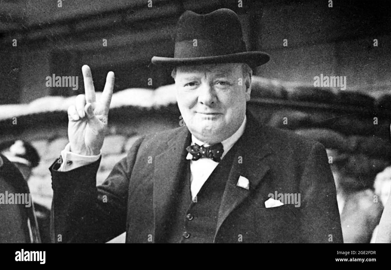 WINSTON CHURCHILL (1874-1965) British Conservative Prime Minister giving his famous V sign about 1940 Stock Photo