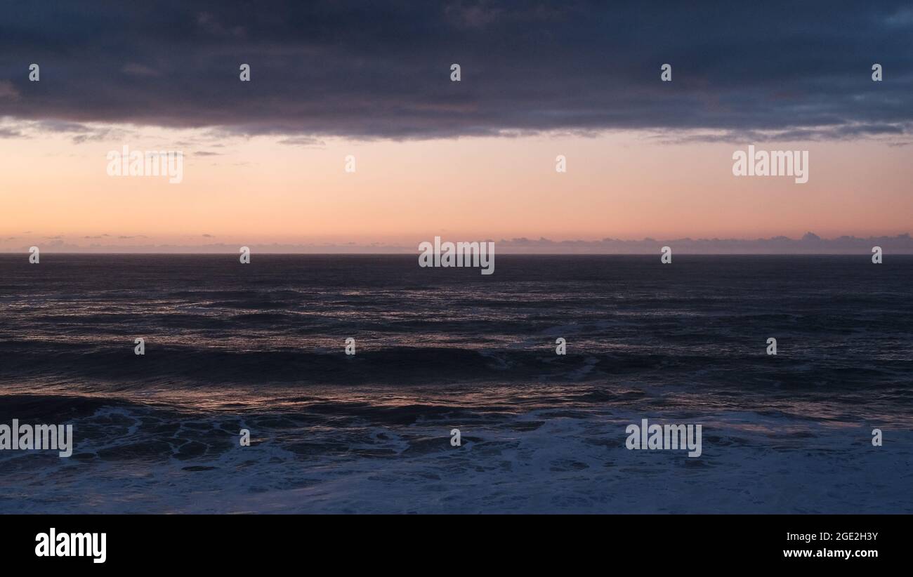 Sunset along the Oregon coast line Stock Photo - Alamy