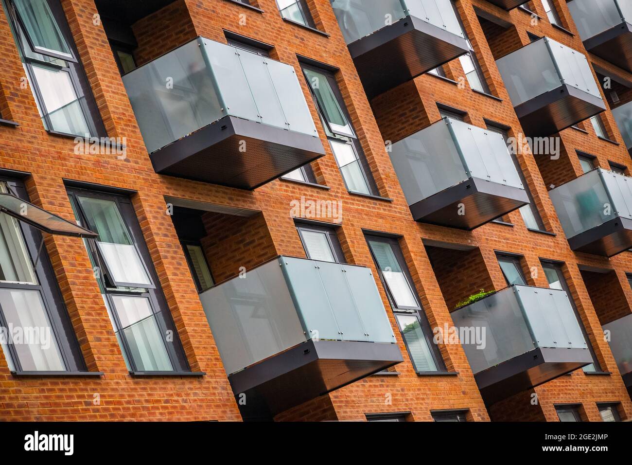 Facade of a modern block of apartments with balconies around Hackney in London Stock Photo
