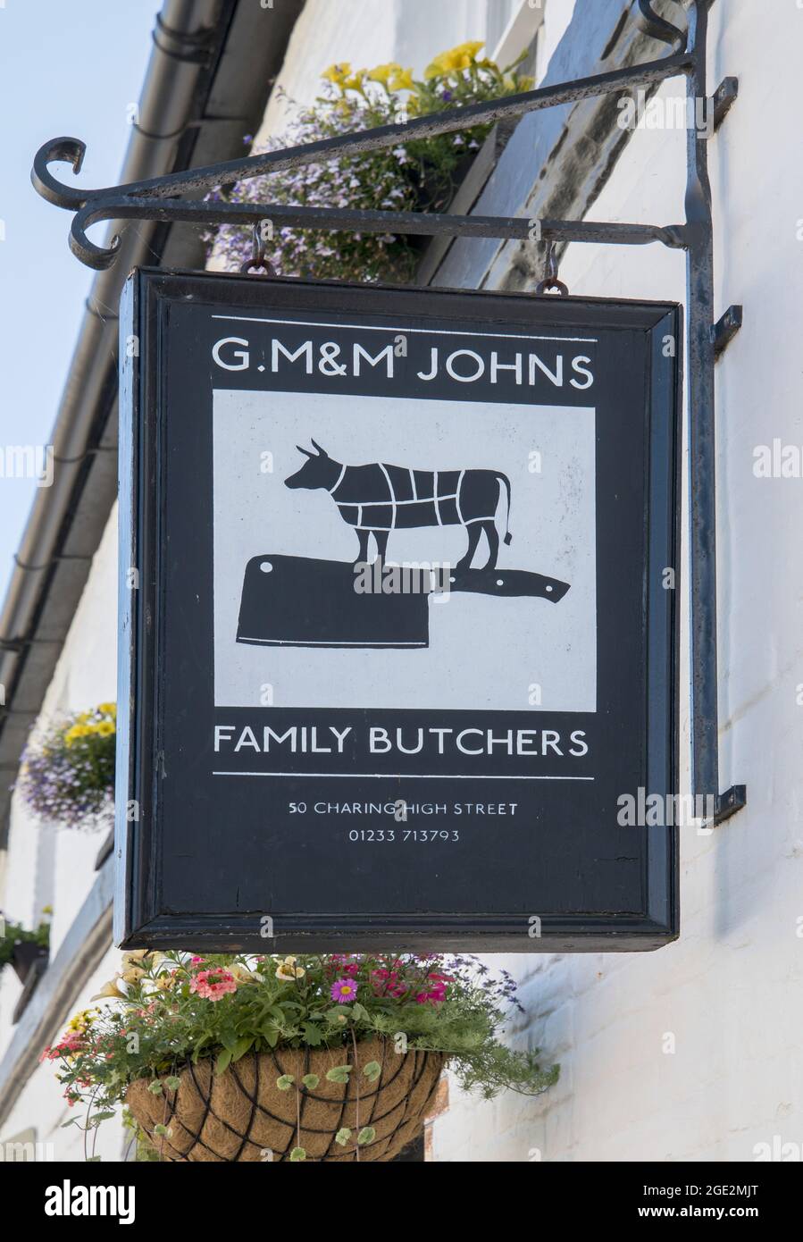 butcher in the high street in the village of charing kent Stock Photo Alamy