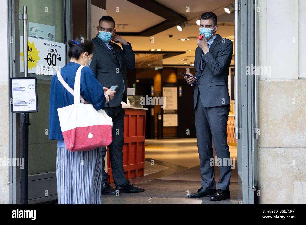 Security guards of the Galerie Lafayette at the Grands Magasins in ...