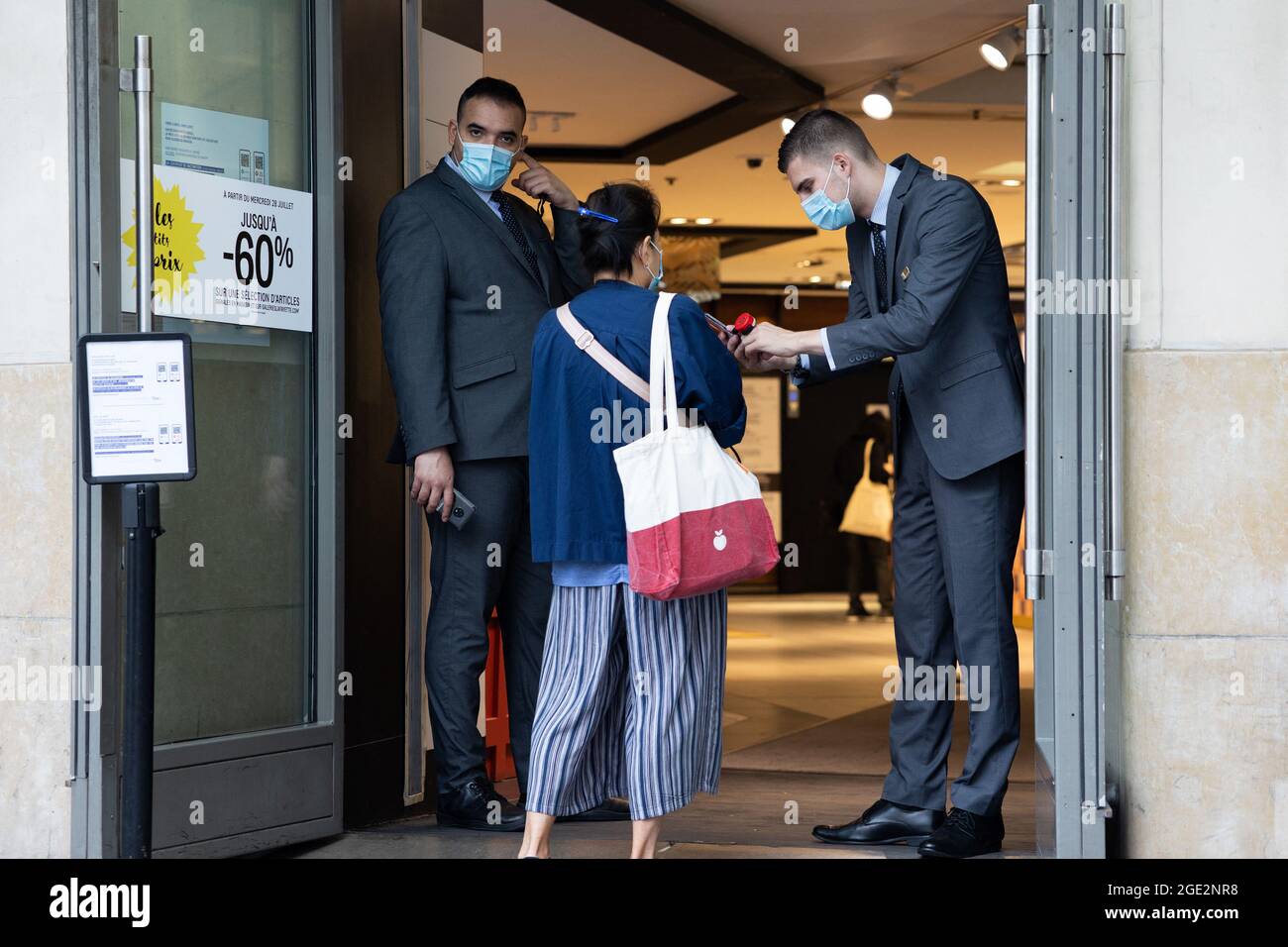 Security guards of the Galerie Lafayette at the Grands Magasins in ...