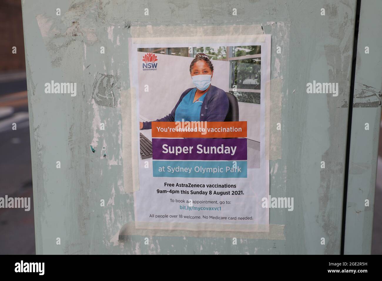 A poster in Burwood, Sydney advertises free Astra Zeneca vaccinations at Sydney Olympic Park. Stock Photo