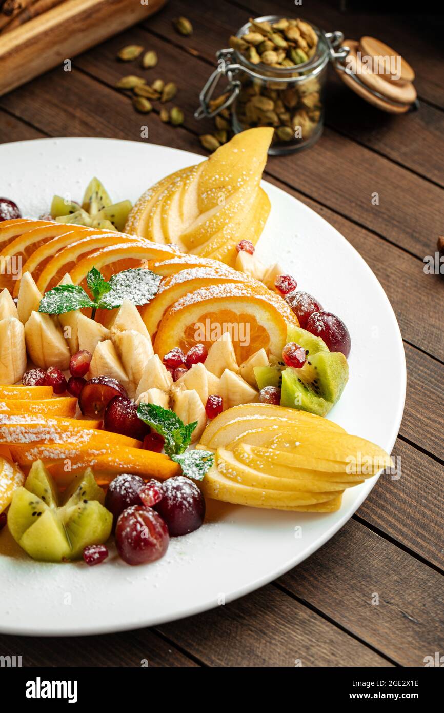 Assorted fruit plate set appetizer Stock Photo Alamy