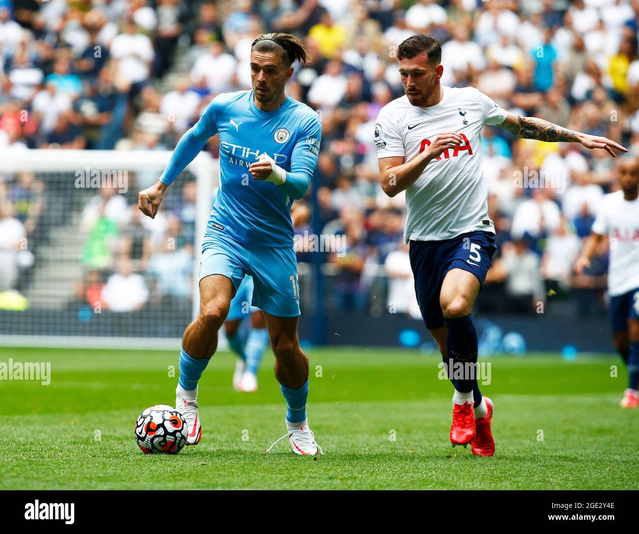 London, England - August 15 :L-R Manchester City's Jack Grealish and Tottenham Hotspur's Pierre-Emile Hojbjerg during Premier League between Tottenham Stock Photo