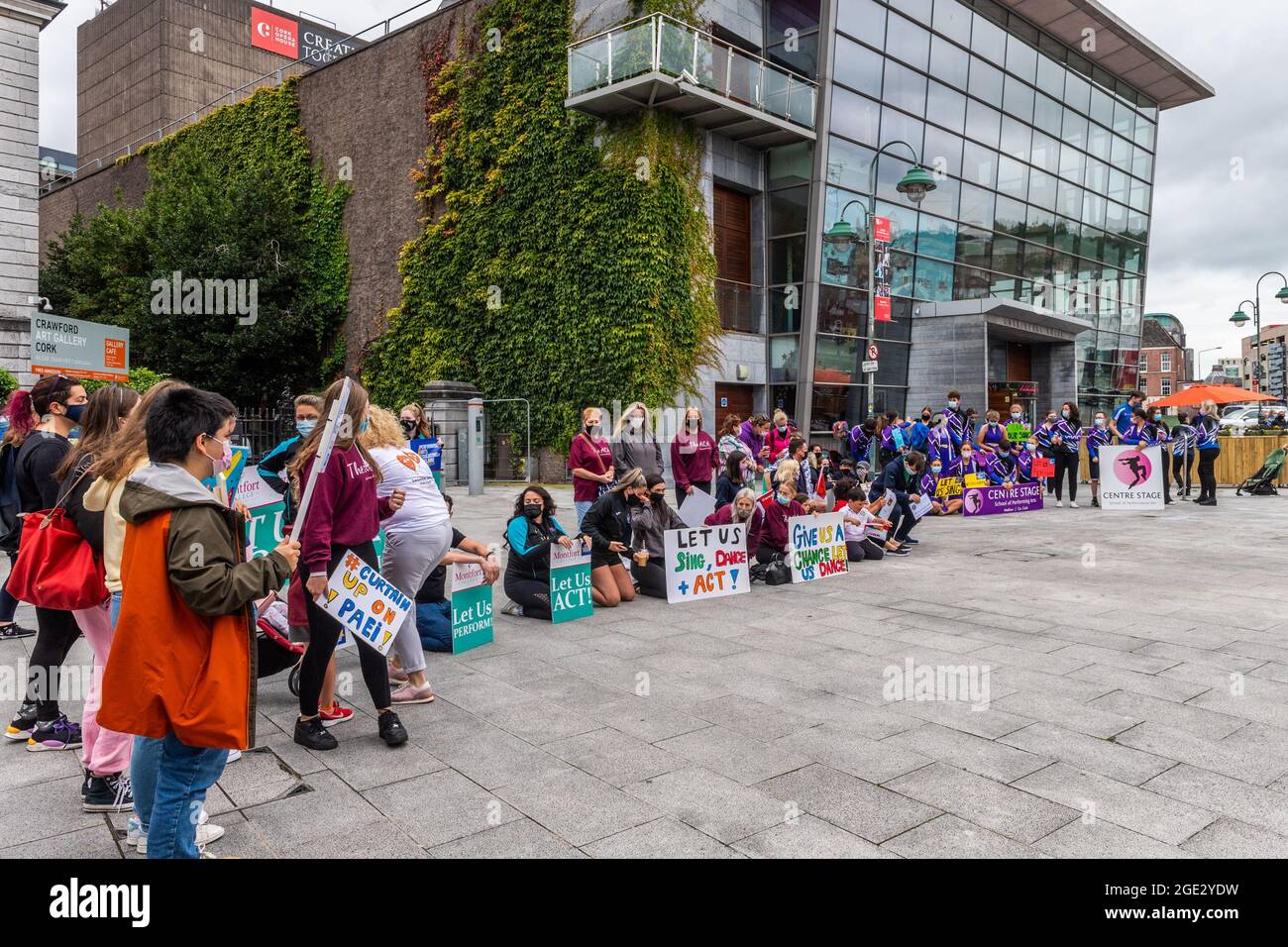 Cork, Ireland. 16th Aug, 2021. A large group of around 150 dancers, actors, musicians and students gathered outside the Opera House in Cork this morning to protest at the lack of returning roadmap to their lessons after COVID. Protestors bemoaned the fact regular schools are operating and yet the performing arts have 'been left out'. Credit: AG News/Alamy Live News Stock Photo