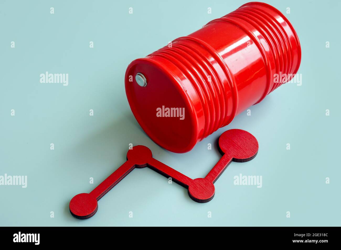 Oil price rise concept. Red barrel and rising arrow. Stock Photo