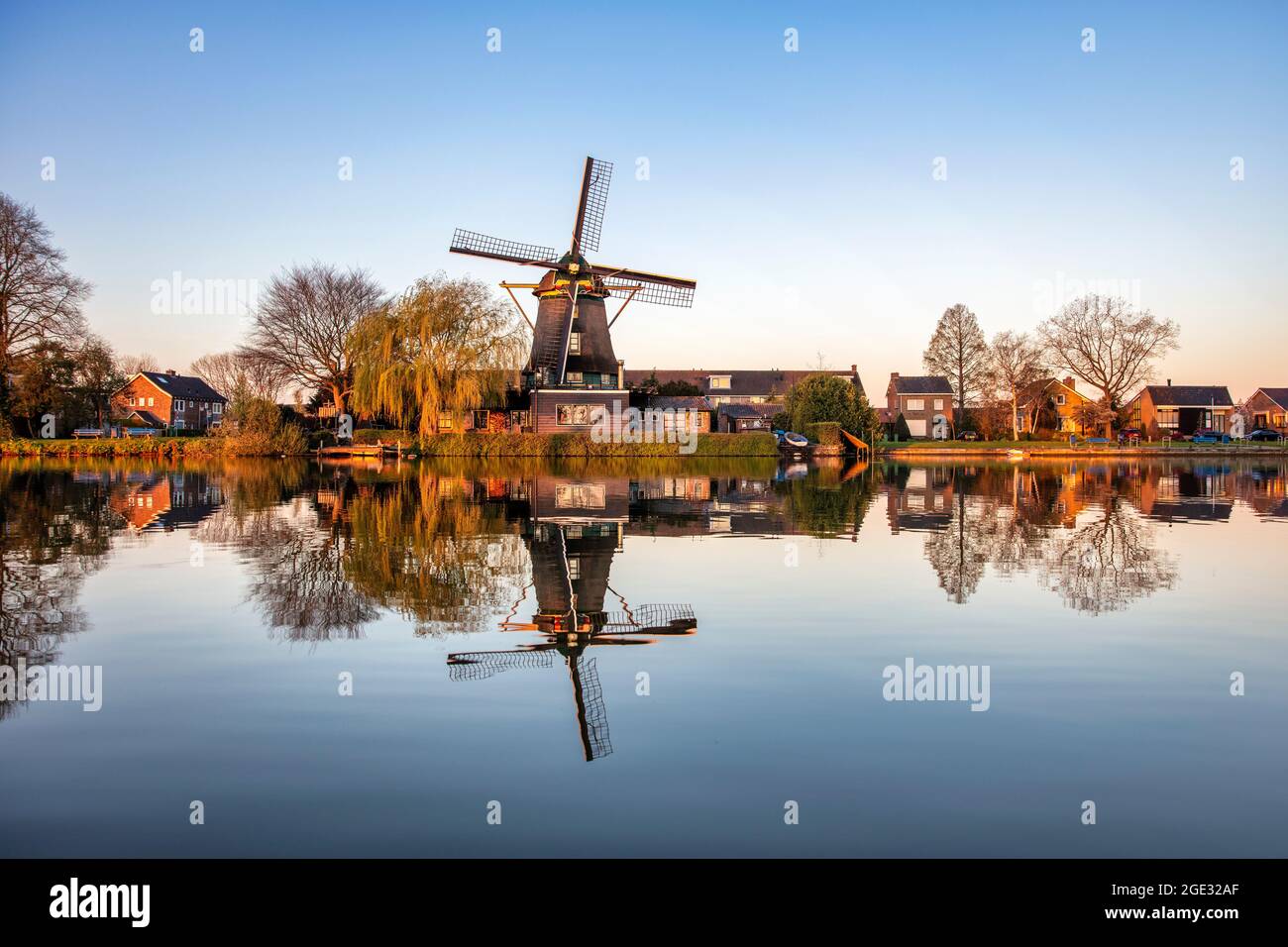 The Netherlands, Weesp, Vecht river. Windmill for grinding flour. Stock Photo