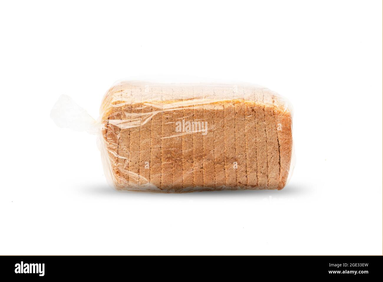 single loaf of sliced white bread, isolate on a white background. slices of toast, side view in a cellophane package, there is a mock up. Stock Photo