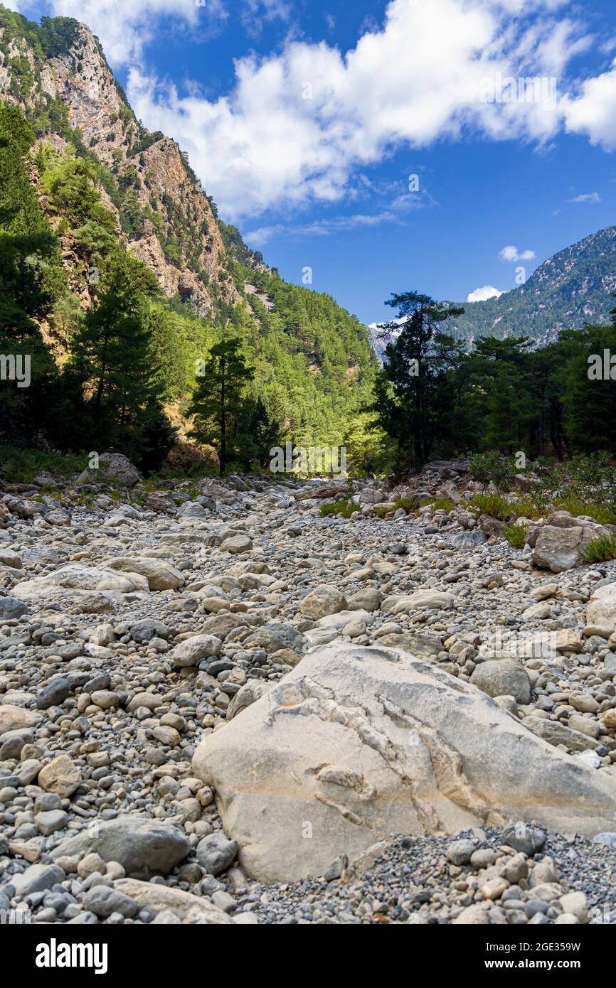 Beautiful mountain scenery of a gorge surrounded by tall cliffs and ...