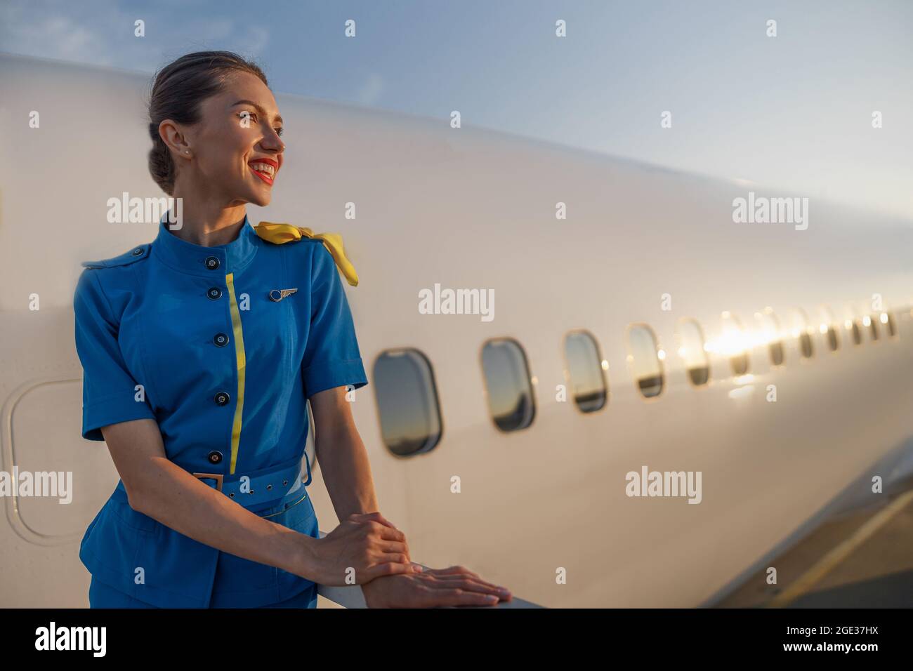 Air hostess in blue uniform hi-res stock photography and images - Alamy