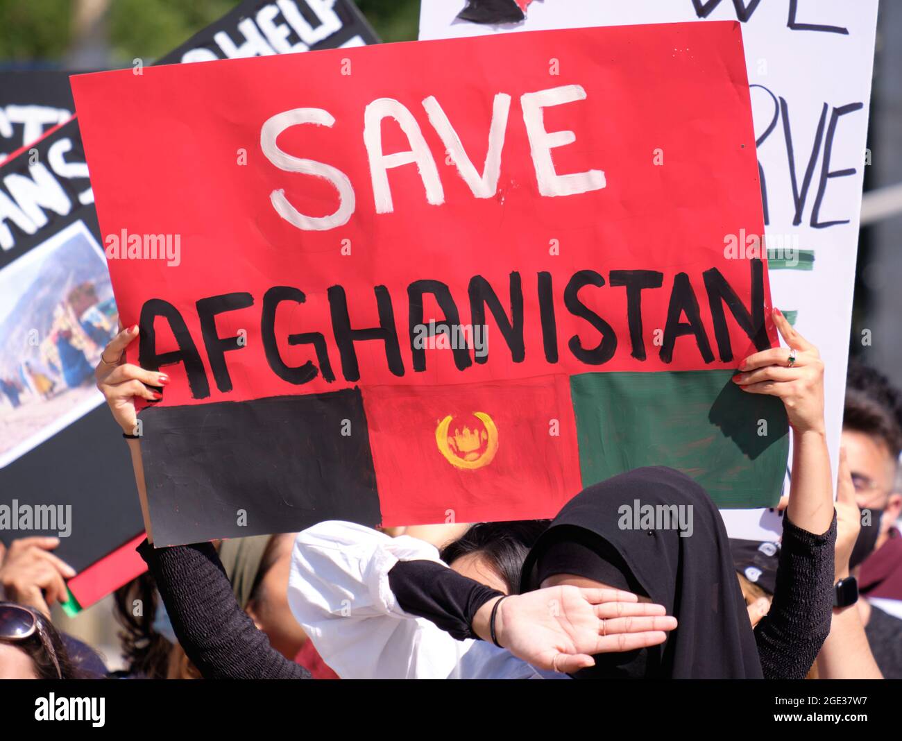 Ottawa, Canada. Save Afghanistan sign at  End War in Afghanistan protest from local diaspora. Stock Photo