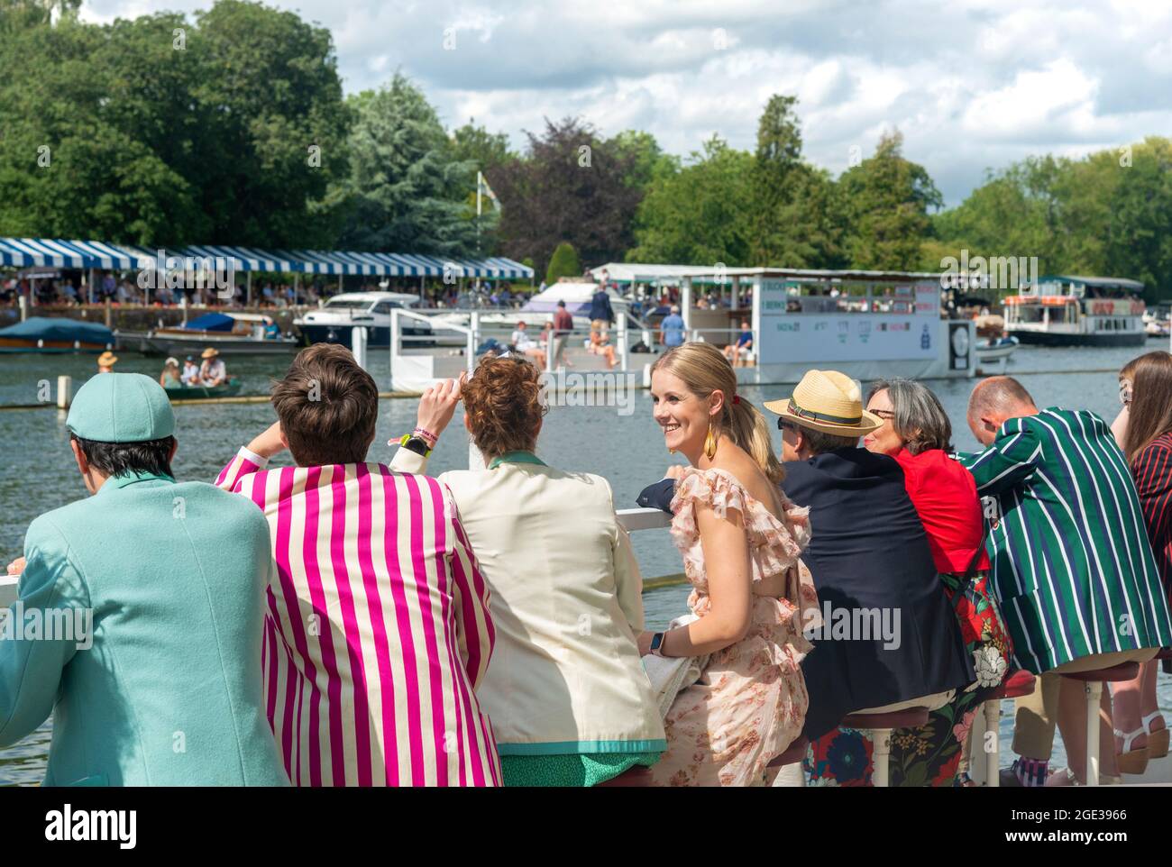 Spectators watch the rowing from the Steward s Enclosure men wearing rowing club blazers at the Henley Royal Regatta 2021 Henley on Thames England Stock Photo Alamy