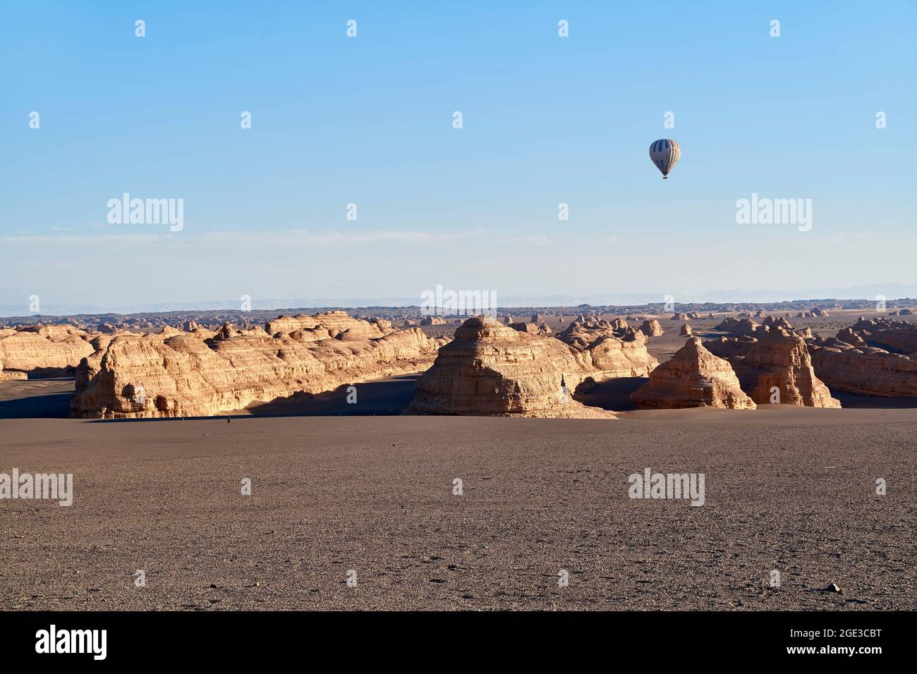 hot air balloon over yardan landforms in the national geological park near dunhuang, guansu province, china Stock Photo
