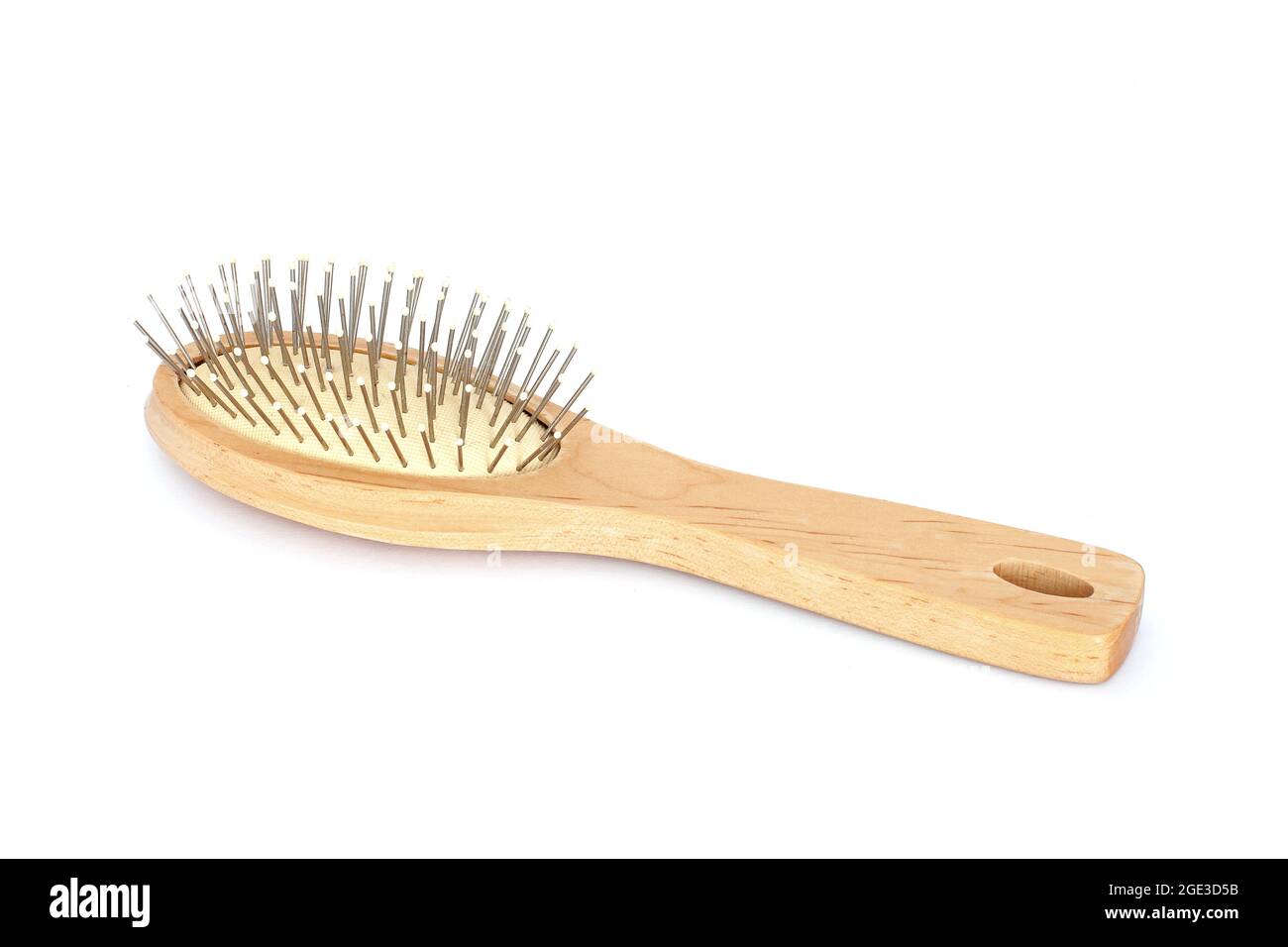 Wooden comb on clean background Stock Photo - Alamy
