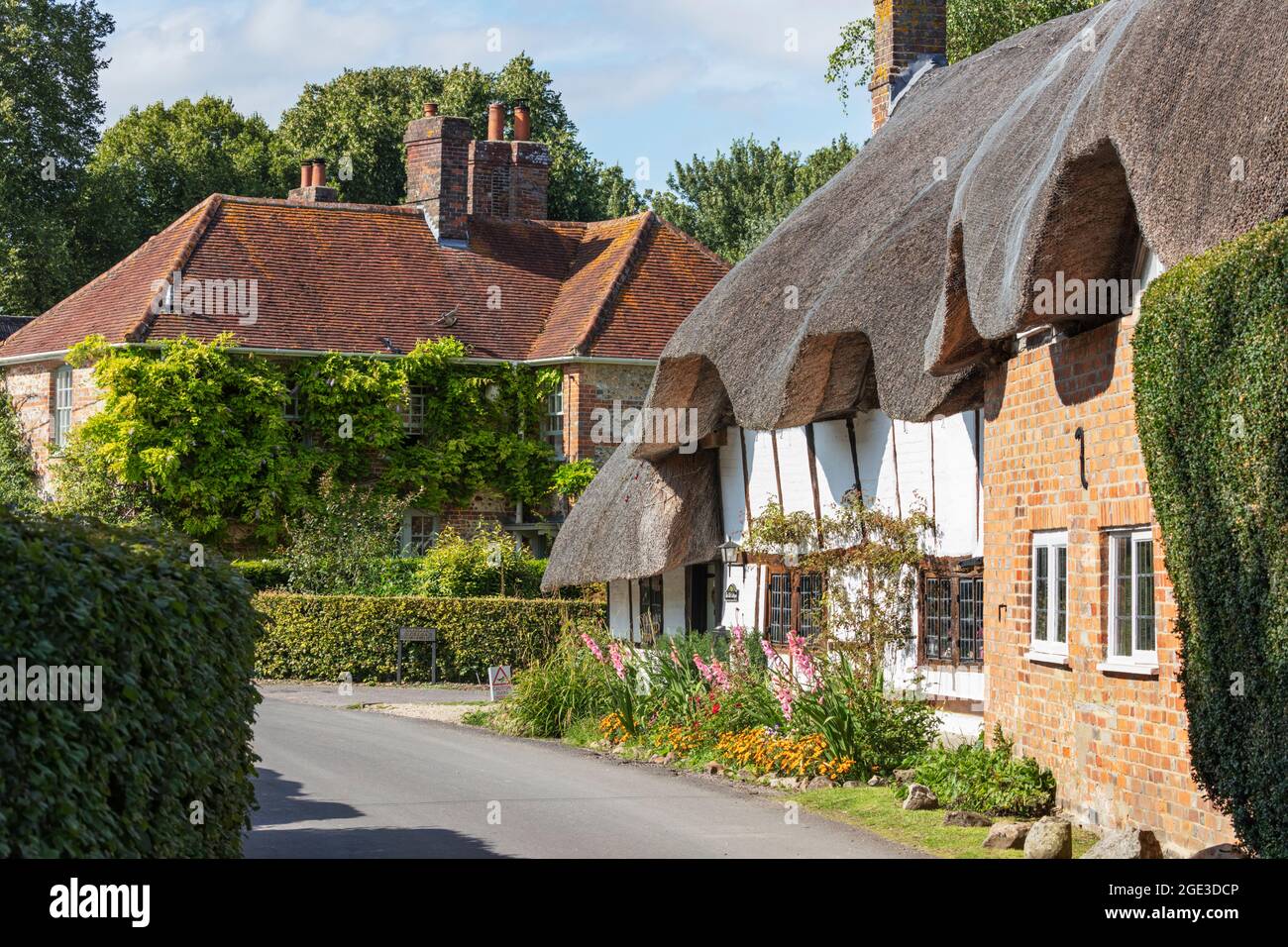 Cottages in the Lambourn Valley village of East Garston in summer, East Garston, Berkshire, England, United Kingdom, Europe Stock Photo