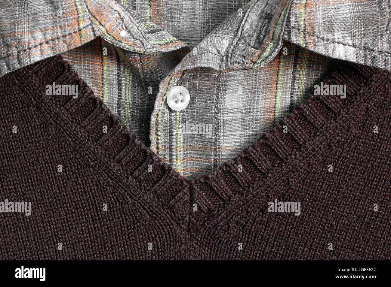 Checkered shirt under a sweater Stock Photo