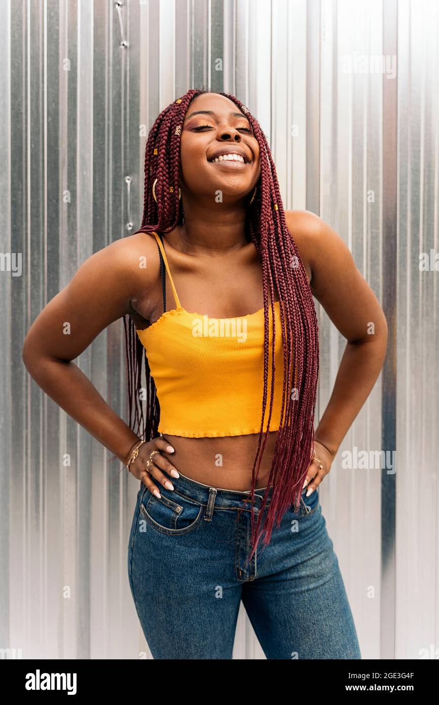 Woman afro braids having outdoors hi-res stock photography and images ...
