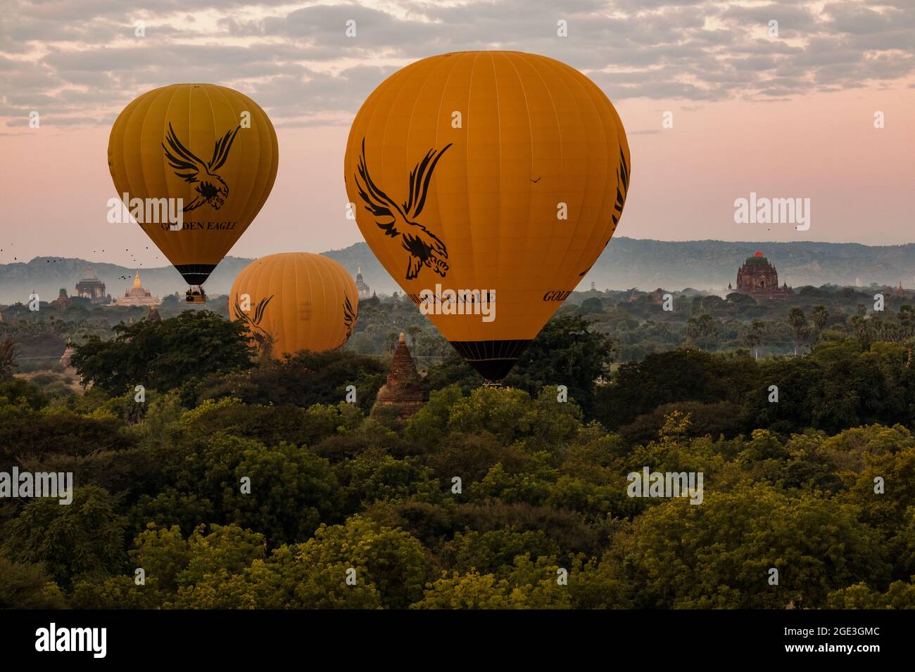 The hot air balloon ride over the temples of Bagan in Myanmar starts early in the morning before sunrise Stock Photo