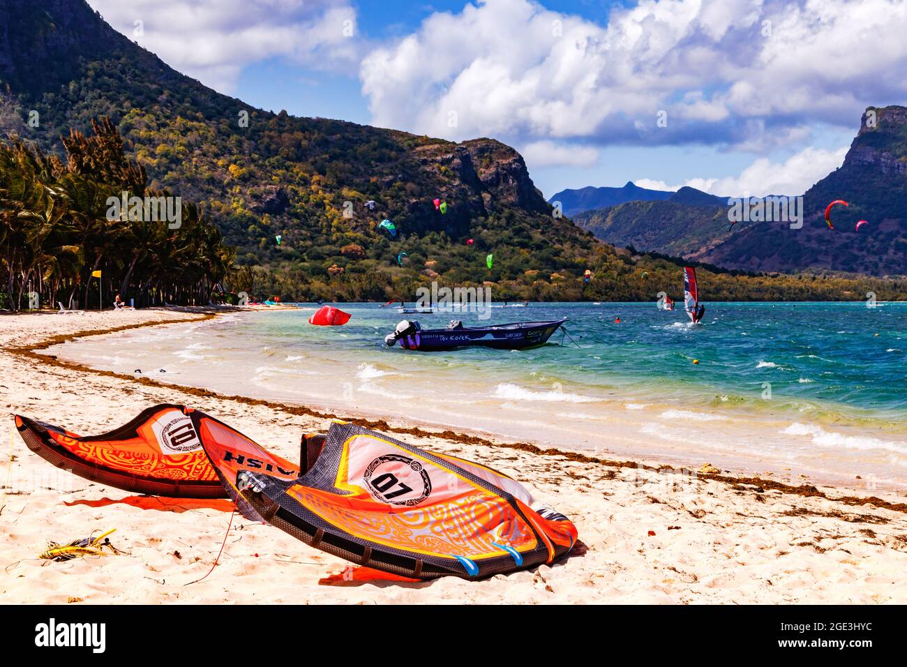 The beach of Le Morne is set against the majestic backdrop of mountain in the east of the tropical island of Mauritius Stock Photo