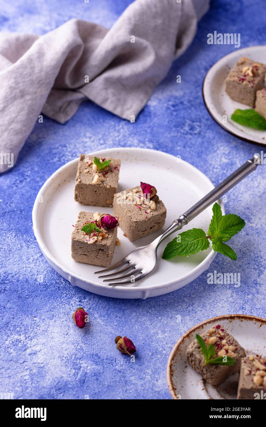 Halva with rose petal and nuts Stock Photo Alamy