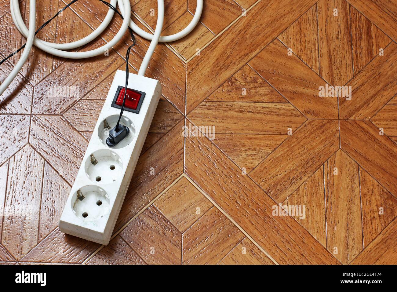 extension cord On the floor. Stock Photo