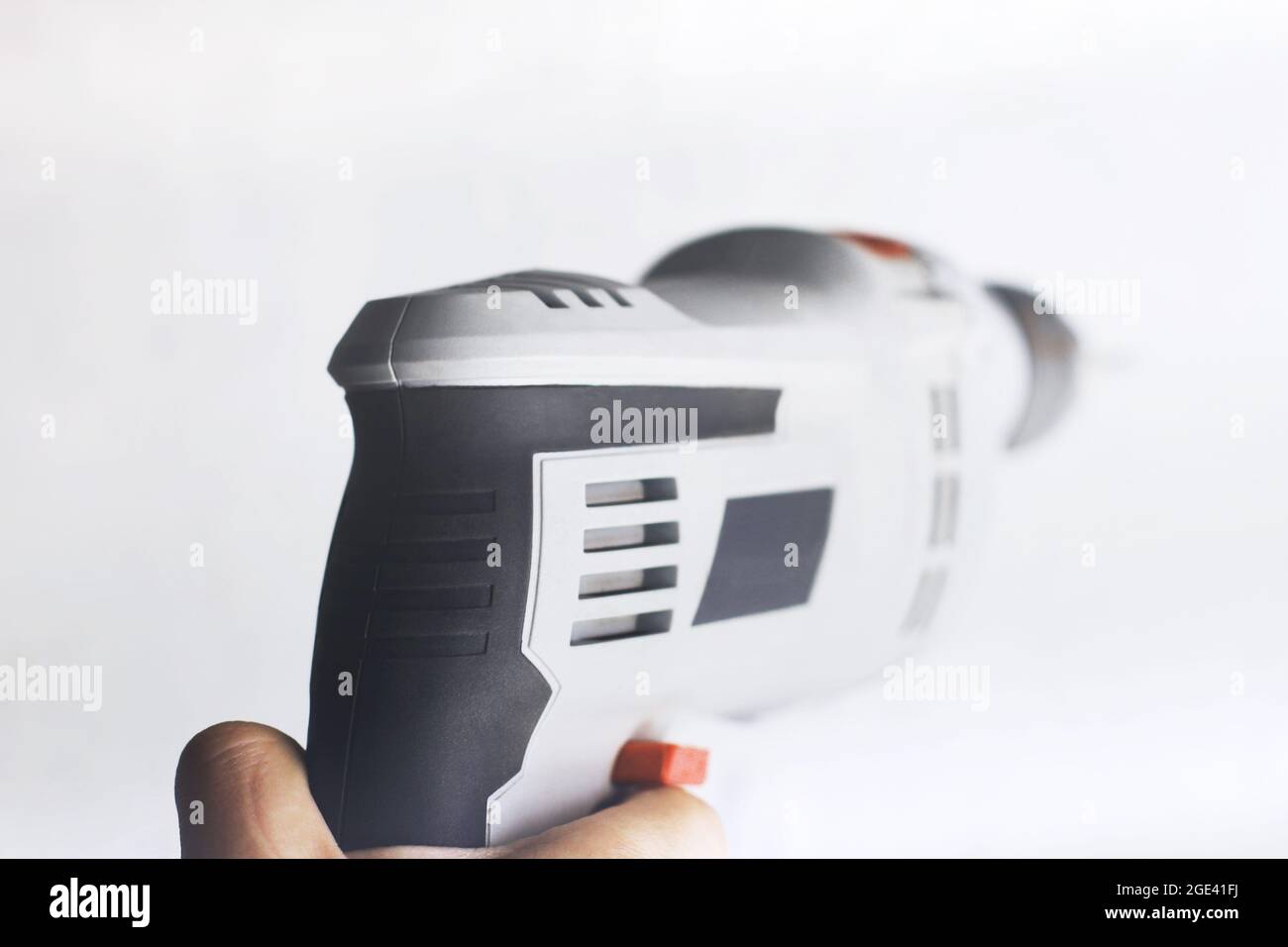 Drill in hand. Repairs Stock Photo Alamy