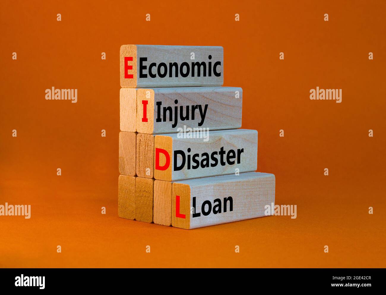 EIDL symbol. Abbreviation EIDL economic injury disaster loan on wooden