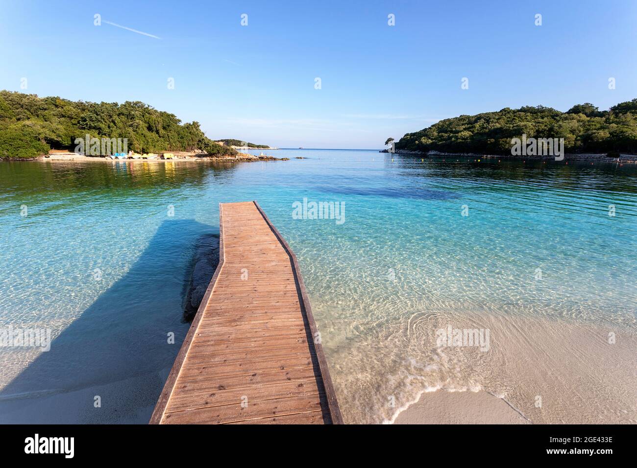 beautiful-ionian-sea-with-clear-turquoise-water-wooden-pier-and-fine