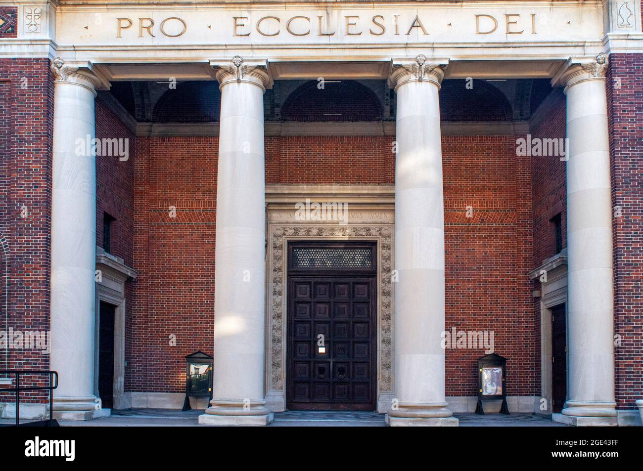 The exterior of Columbia University's St. Pauls Chapel (1907), looking toward the apse. It clad in red brick and limestone. Stock Photo