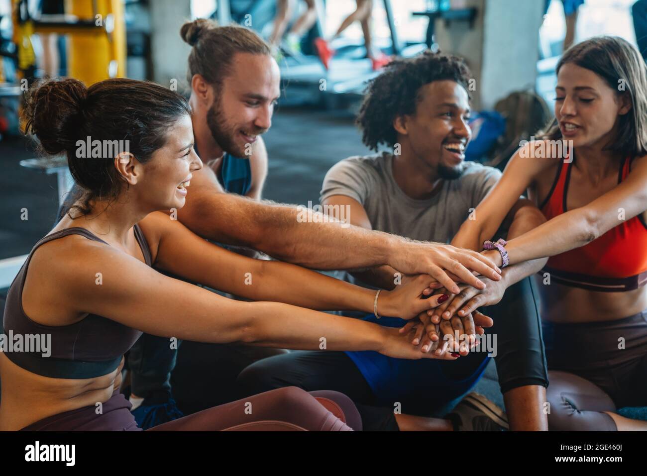 Beautiful fit people working out in gym together Stock Photo - Alamy