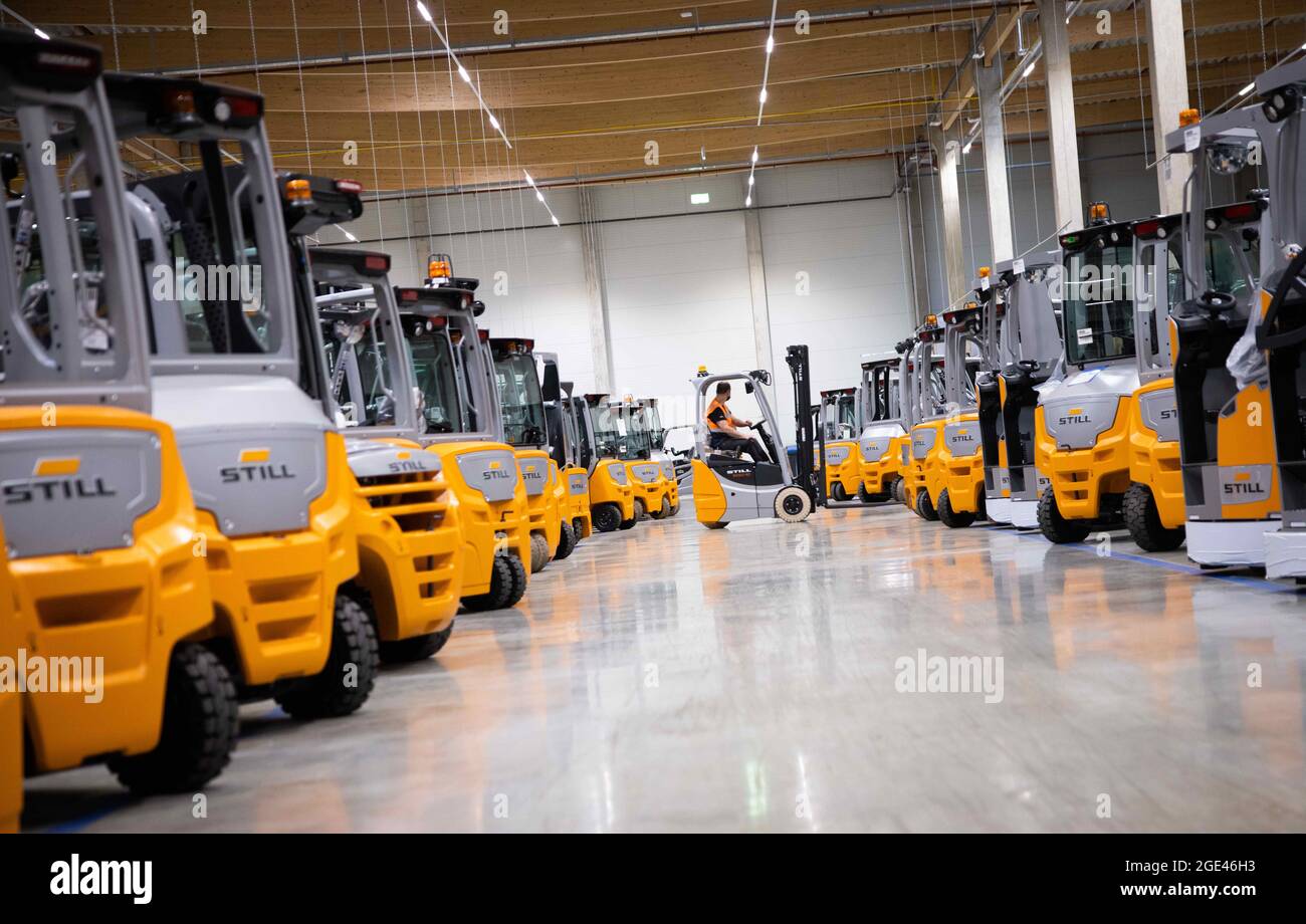 Hamburg, Germany. 04th Aug, 2021. A forklift truck travels between new