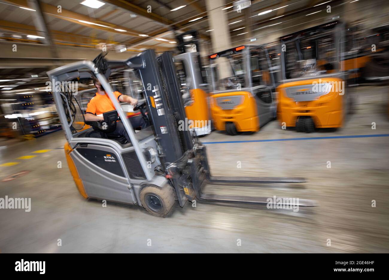 Hamburg, Germany. 04th Aug, 2021. A forklift truck travels between new
