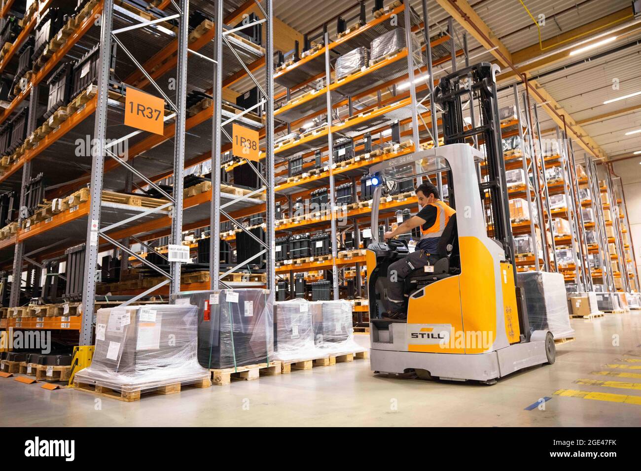 Hamburg, Germany. 04th Aug, 2021. A man works with a forklift between