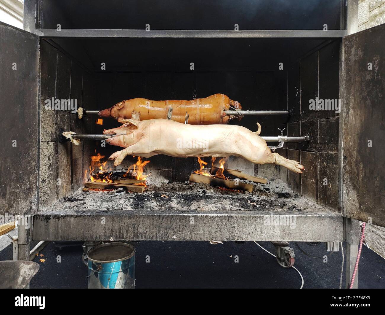 Porks grilling in a oven Stock Photo