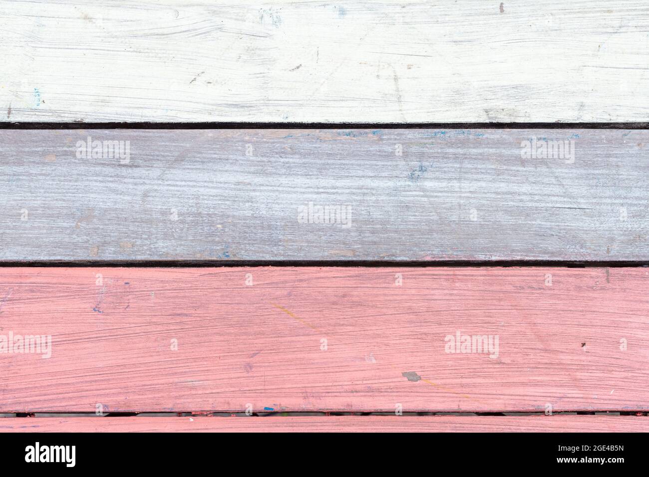 Abstract background of colored in pink, grey and white paint old and grunge wooden planks with copy space Stock Photo