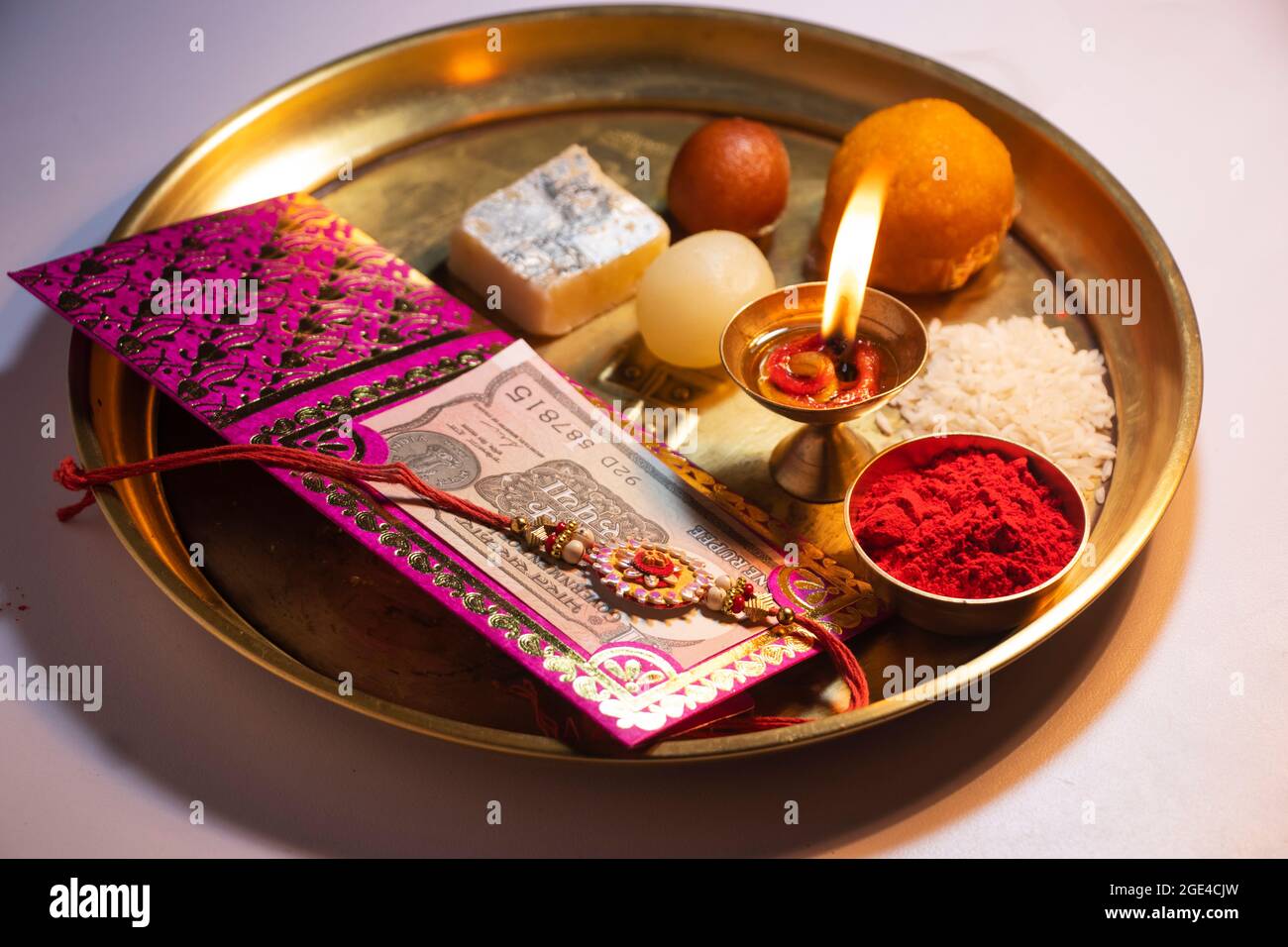 Raksha Bandhan Traditional Rakhis placed in Decorative plate with sweet