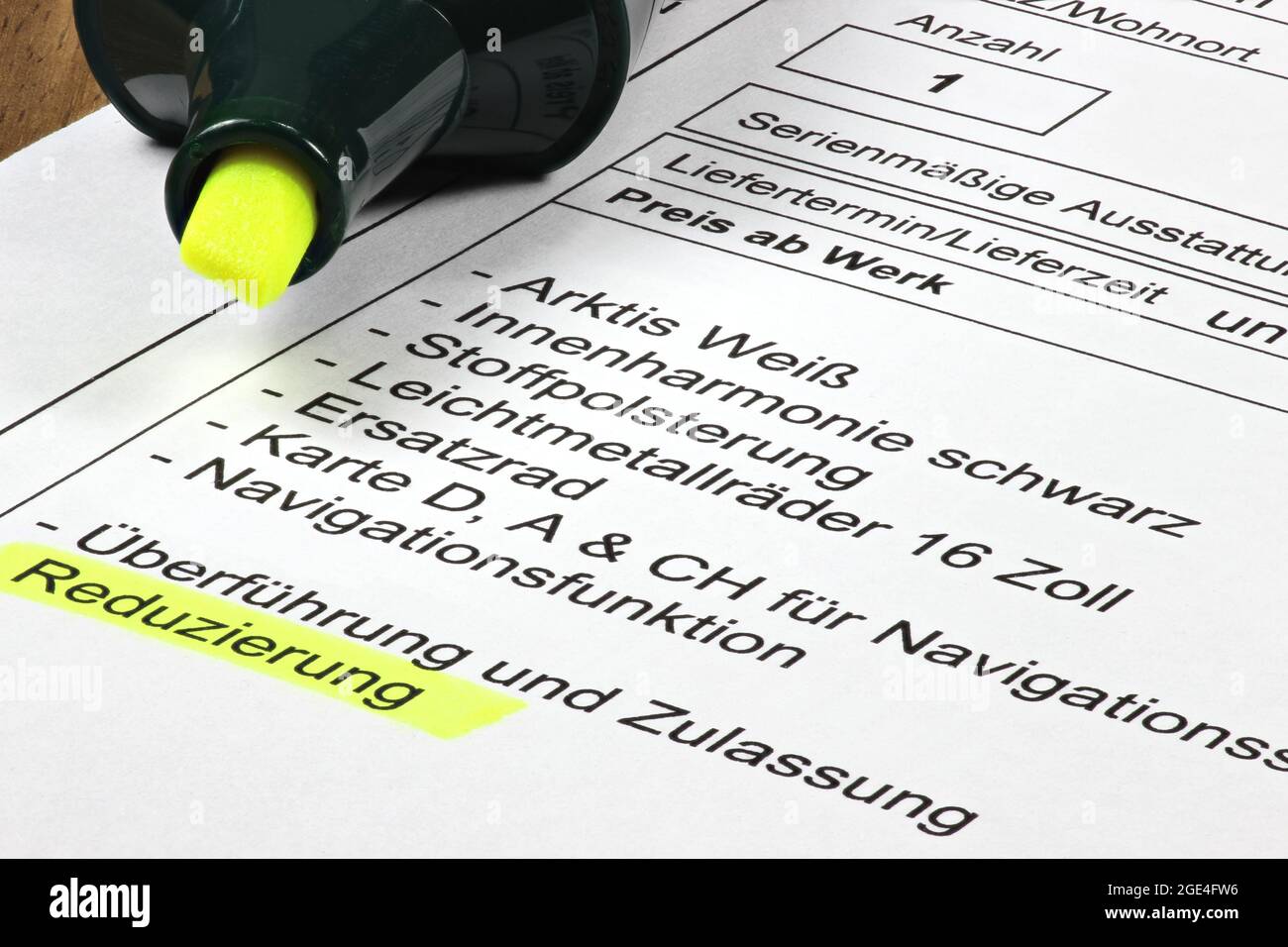 line items on a German sales contract for a new car with a marked discount Stock Photo