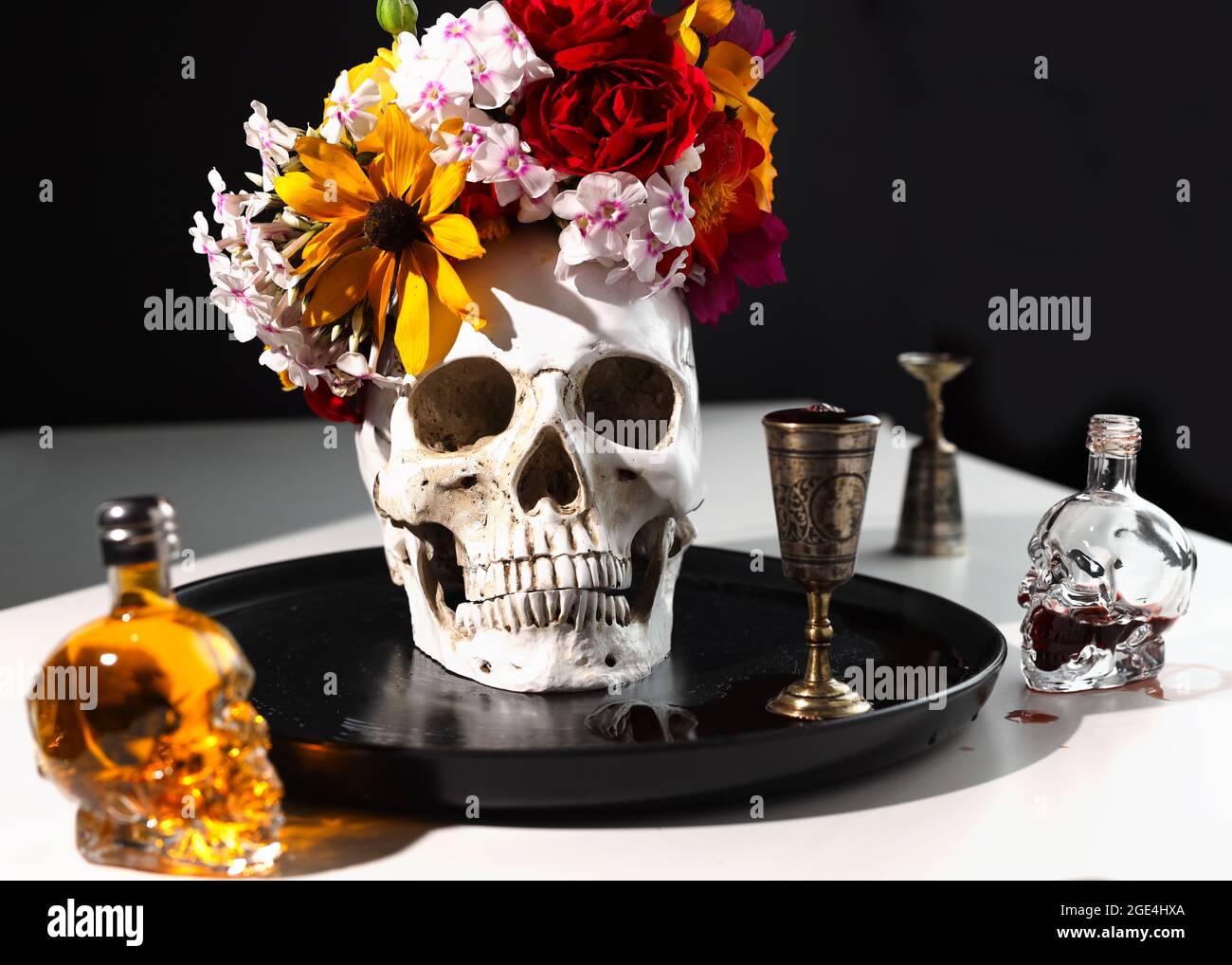 Skull with flowers wreath. Concept of Day of the dead, Dia De Los Muertos. Halloween Celebration Decor. Stock Photo