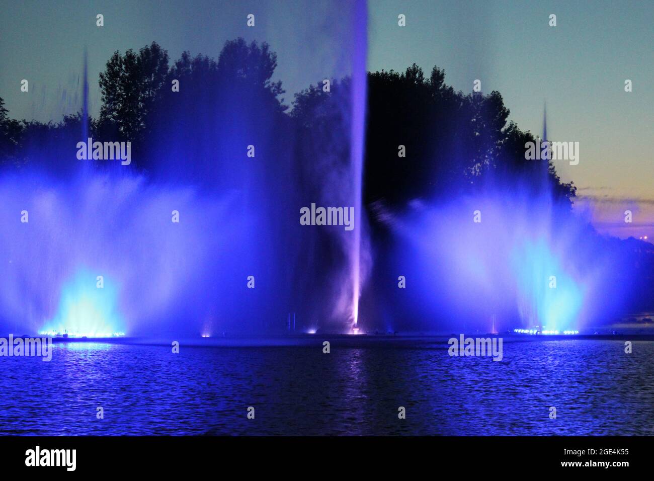 Colored fountain in the night city Stock Photo - Alamy
