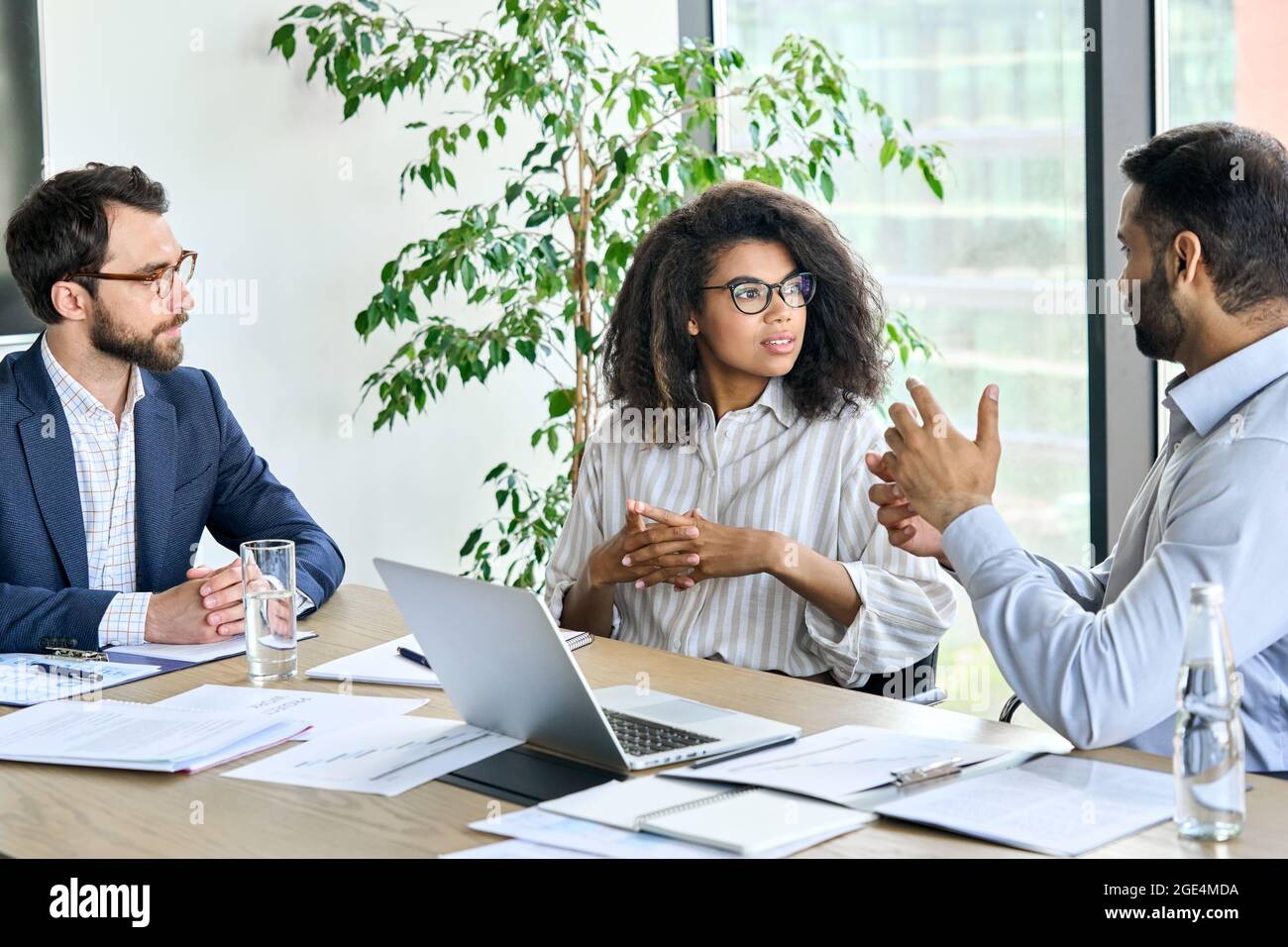 International business executive team having discussion at boardroom meeting. Stock Photo